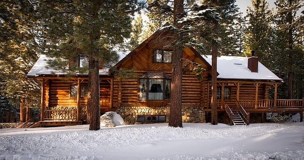 log cabin in snowy area